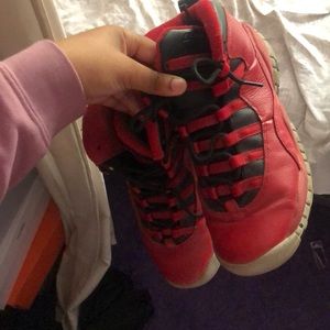 red and black jordan 10’s